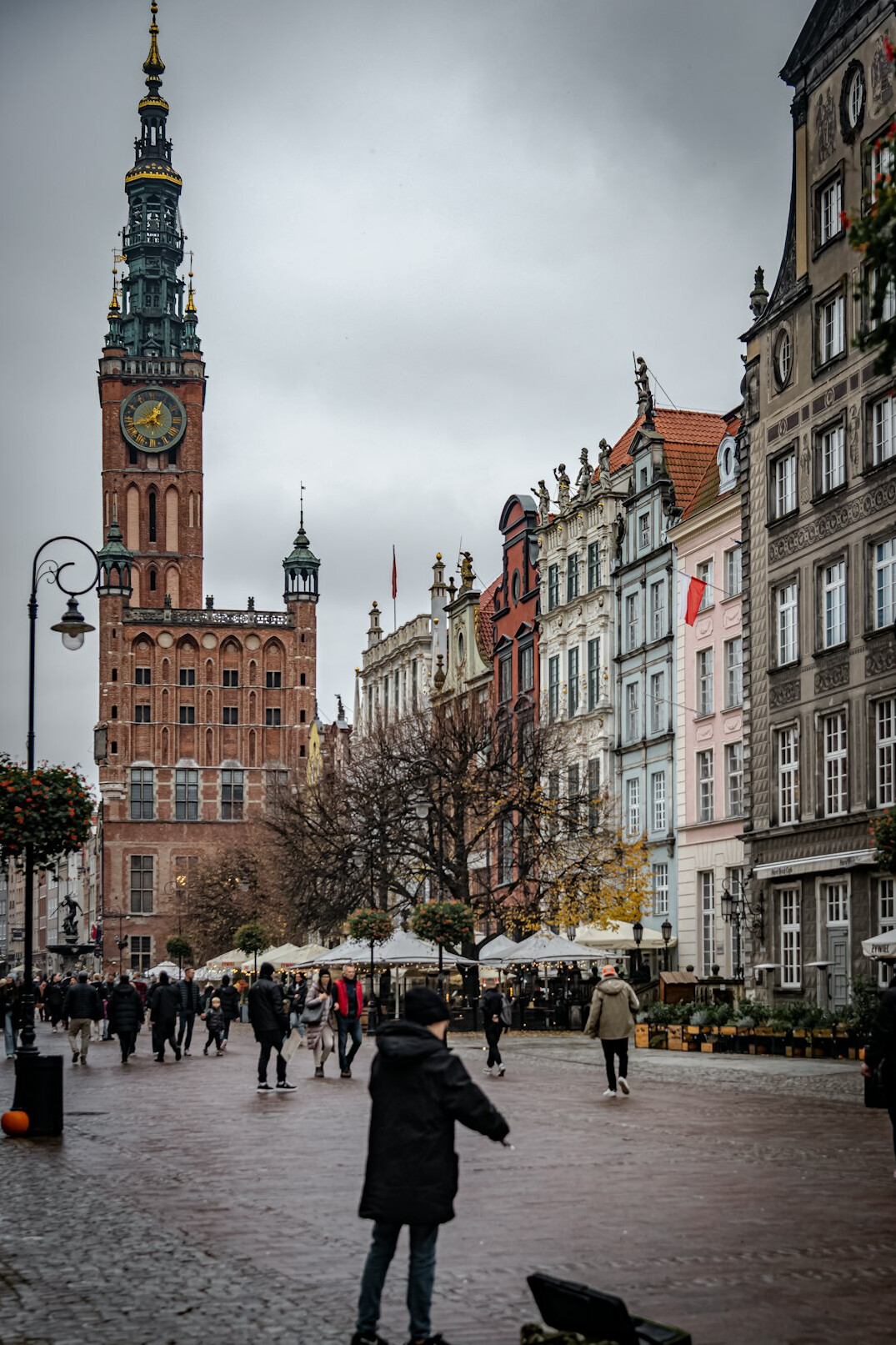 City square with a clock tower in the background